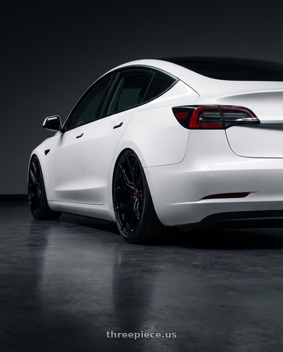 2023 Tesla Model 3 with Vossen HF-5 19x8.5 / 5x114.3 / ET32 / Flat Face / 73.1 - Gloss Black Wheel - HF5-9N60 wheels rear three quarter view slight stretch tires