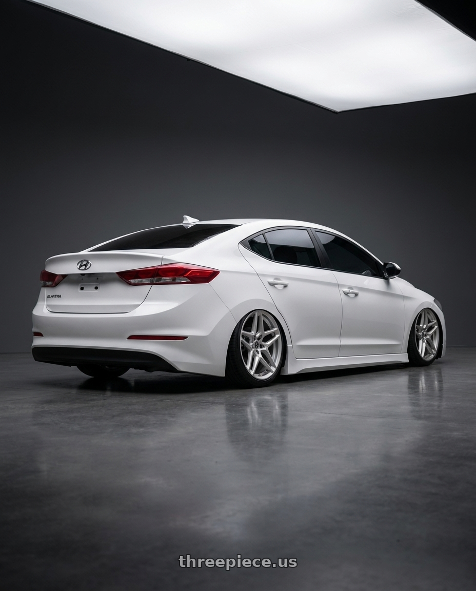 2018 Hyundai elantra with Heritage Wheel EBISU MonoC 5x114.3 18x8.5+35 Silver wheels rear three quarter view slight stretch tires