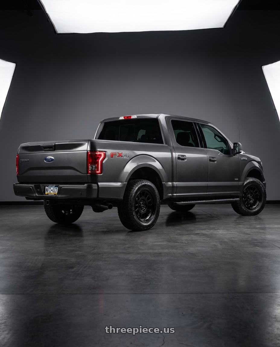 2015 Ford F-150 XL with Method Race Wheels 318B 6X135 17x8.5 +0 GLOSS BLACK wheels rear three quarter view square tires