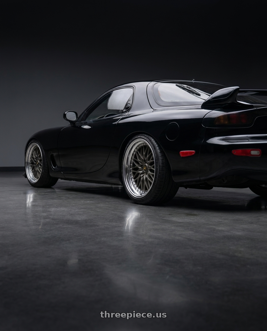 1993 Mazda fd rx7 with Work Vs-Xv 5x114.3 18x10+2 L Disk Matte Dark Gunmetal wheels rear three quarter view slight stretch tires