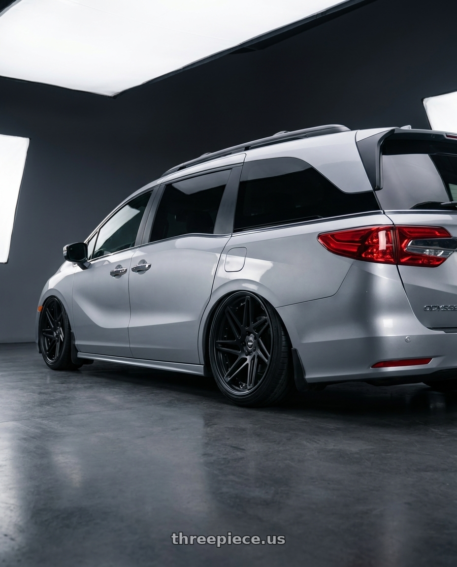 2024 honda odyssey  with Work Zeast st3 5x120 20x8+45 S Disk Matte Black wheels rear three quarter view extreme stretch tires