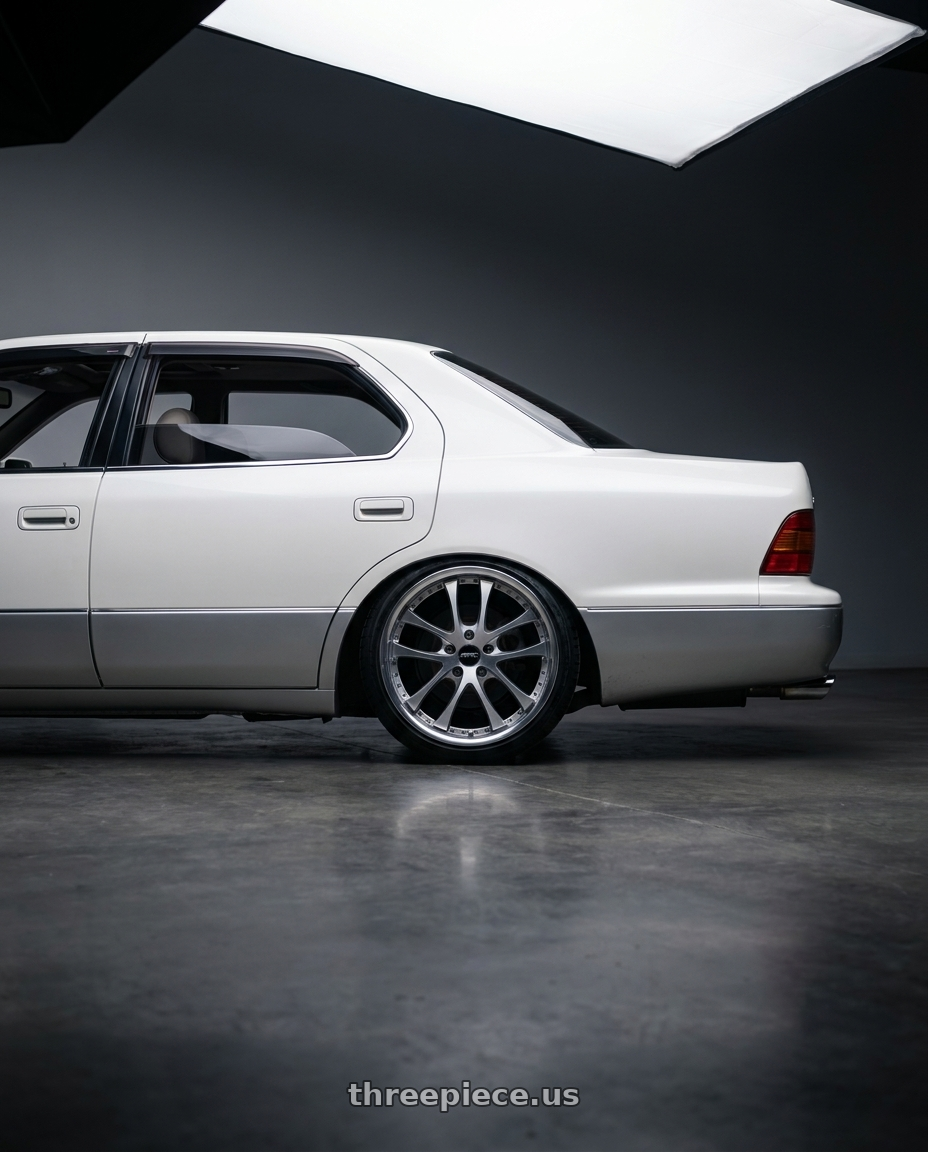 1994 lexus ls400  with ARC AR5 5x114.3 18x9.5  +30 Silver Machine Face Lip Chrome Rivet wheels rear three quarter view square tires