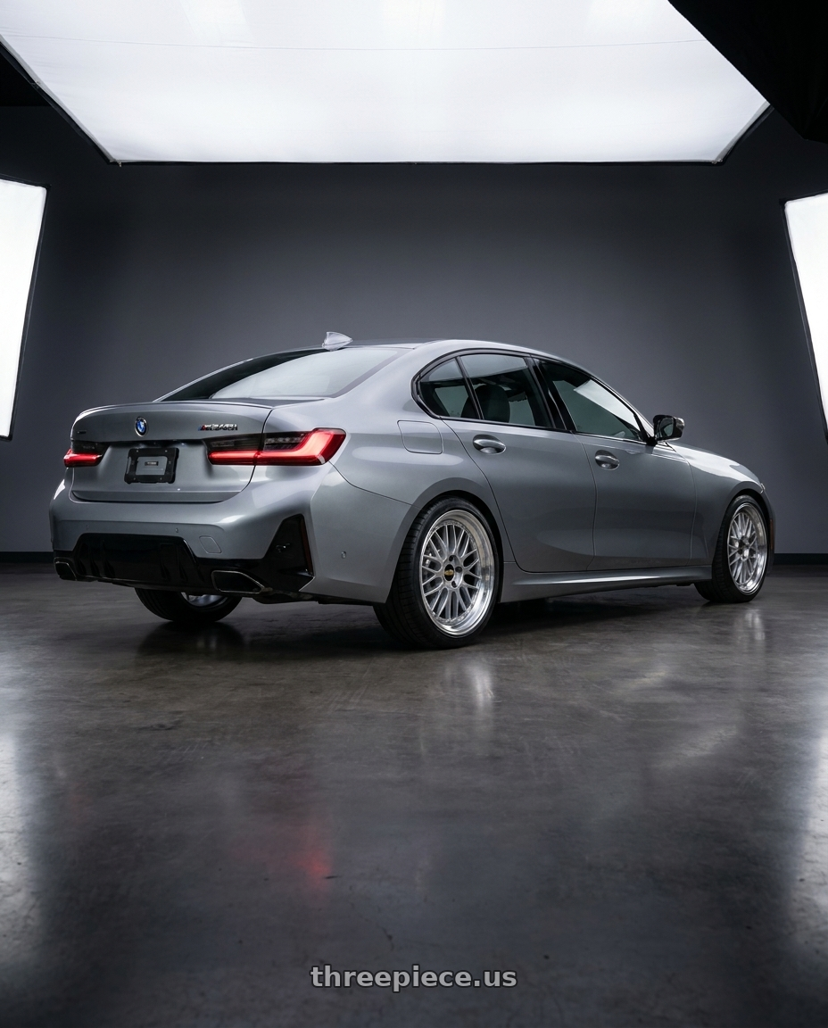 2024 BMW M340i Skyscraper Grey with BBS LM 5x112 19x9.5+38 Diamond Silver wheels rear three quarter view square tires