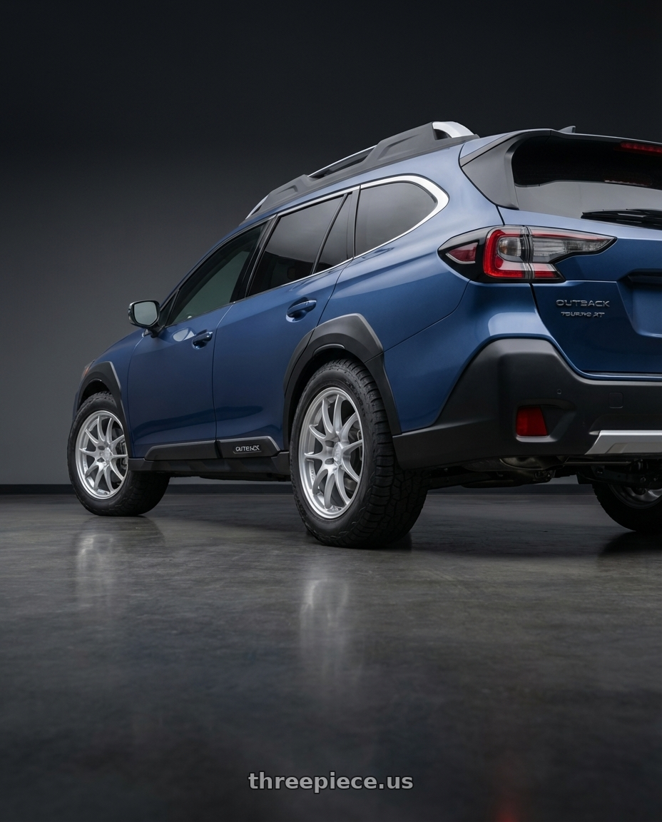 2025 subaru outback touring xt with Enkei PF01 5x114.3 18x8.5+48 Silver wheels rear three quarter view meaty tires