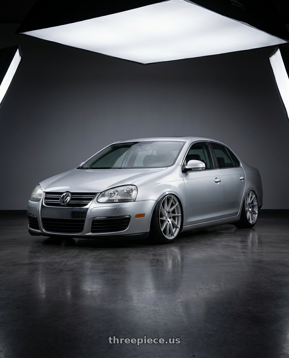 2009 Volkswagen Jetta GLI MK5 with Aodhan AH09 5x112 18x9.5 +35 Gloss Silver Machined Face wheels