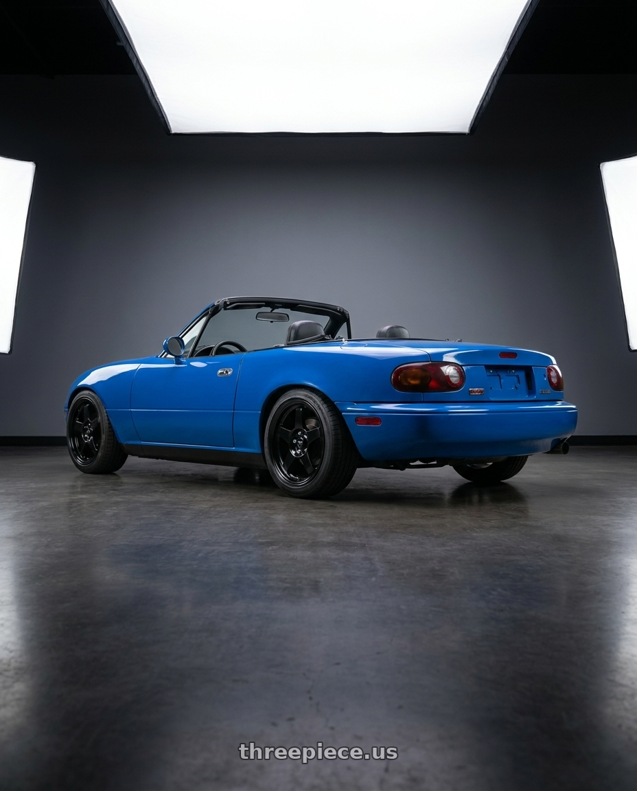 1993 Mazda Miata with Vors LT05 4x100 15x7  +40 Gloss Black wheels rear three quarter view square tires
