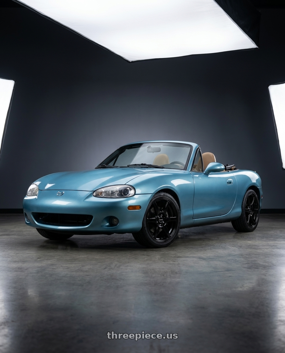 2002 Mazda Miata with Raceline 146B Matrix 4X100/4x114.3 14x5.5 35 Gloss Black wheels