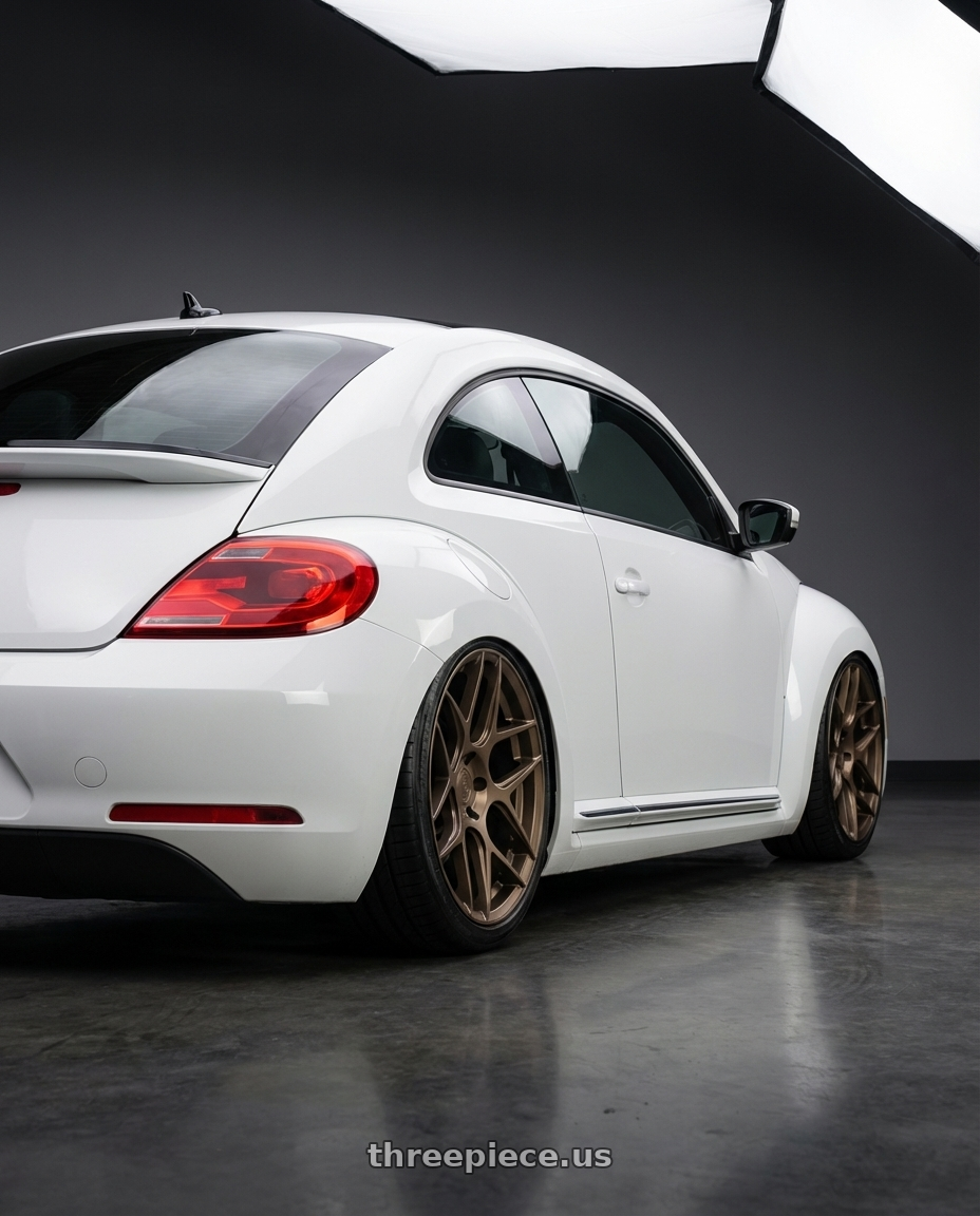 2016 Volkswagen Beetle Turbo with Aodhan AFF2 5x112 19x9.5+35 Matte Bronze wheels rear three quarter view slight stretch tires