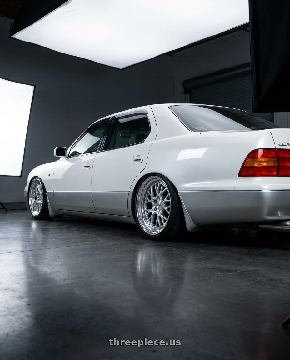 1999 Lexus ls400 with Work Gran Seeker Ccx 5x114.3 19x10+38 O Disk Machined Silver Polish wheels rear three quarter view square tires
