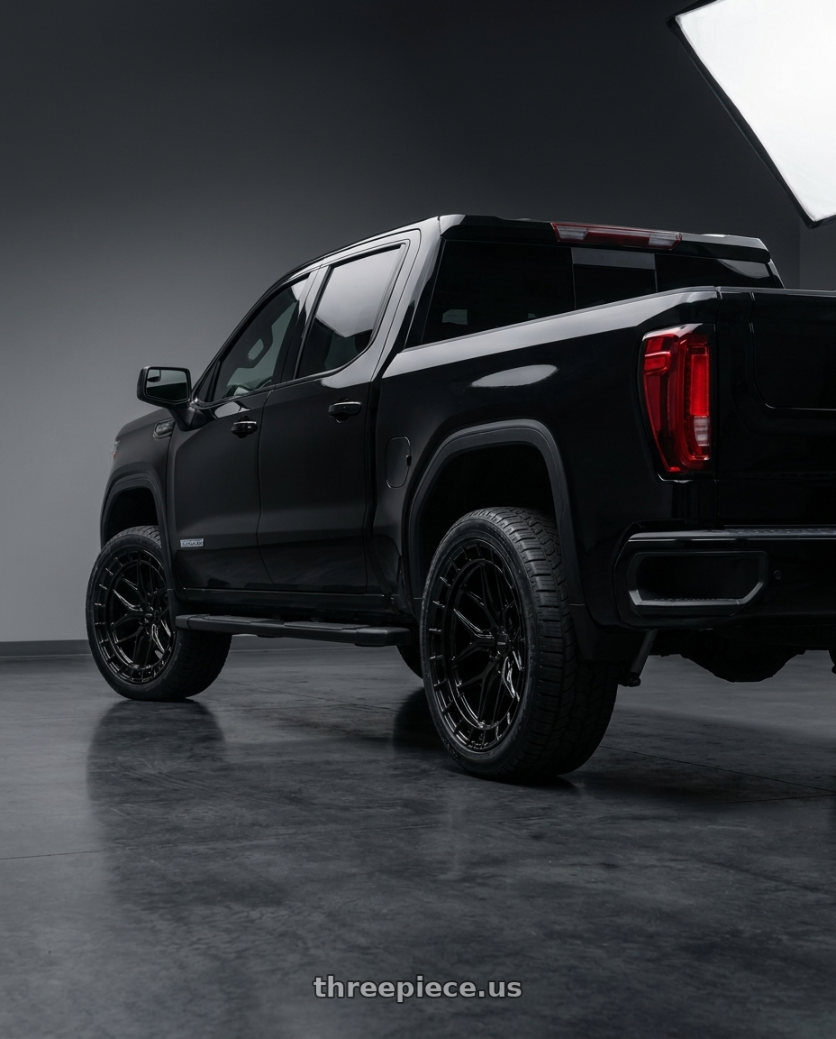 2026 GMC sierra 1500 elevation with VOSSEN HFX-1 6X139.7 17x9 +0 GLOSS BLACK wheels rear three quarter view square tires