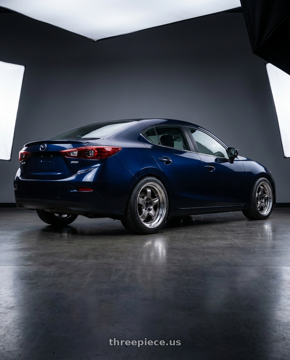 2017 mazda 3 sedan with Work Meister S1 2P 4x100 15x5.5+45 A Disk Black wheels rear three quarter view square tires