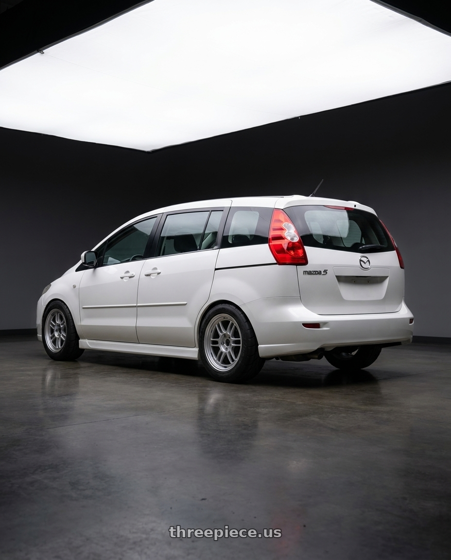 2007 Mazda 5 with Enkei RPF1 5x100 16x7+35 Silver wheels rear three quarter view meaty tires