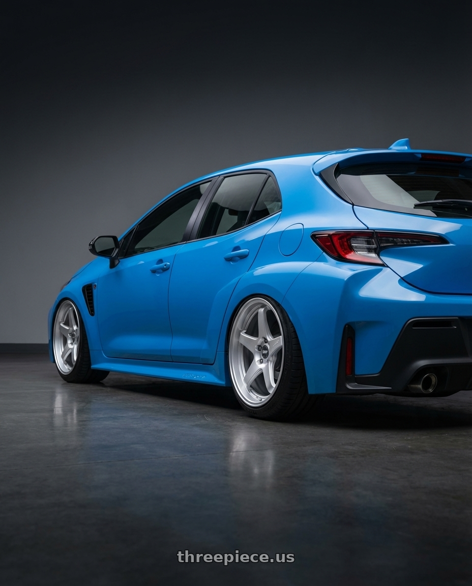 2024 Toyota GR Corolla with ESR Wheels APEX SERIES AP5 5x114.3 18x10.5 +22 Hyper Silver wheels rear three quarter view slight stretch tires