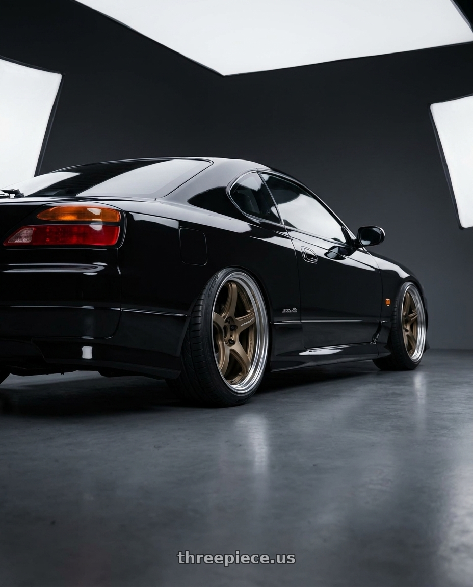 2000 Nissan Silvia S15 with Work T5R 2P 5x114.3 18x9.5 +22 Matte Bronze wheels rear three quarter view slight stretch tires