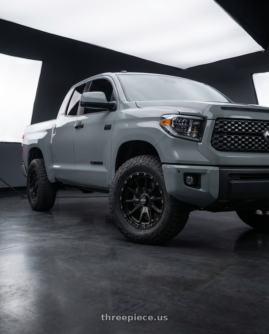 2018 Toyota Tundra with KMC KM100 SYNC 5X150 20X9 +18 SATIN BLACK wheels front three quarter view stock stance