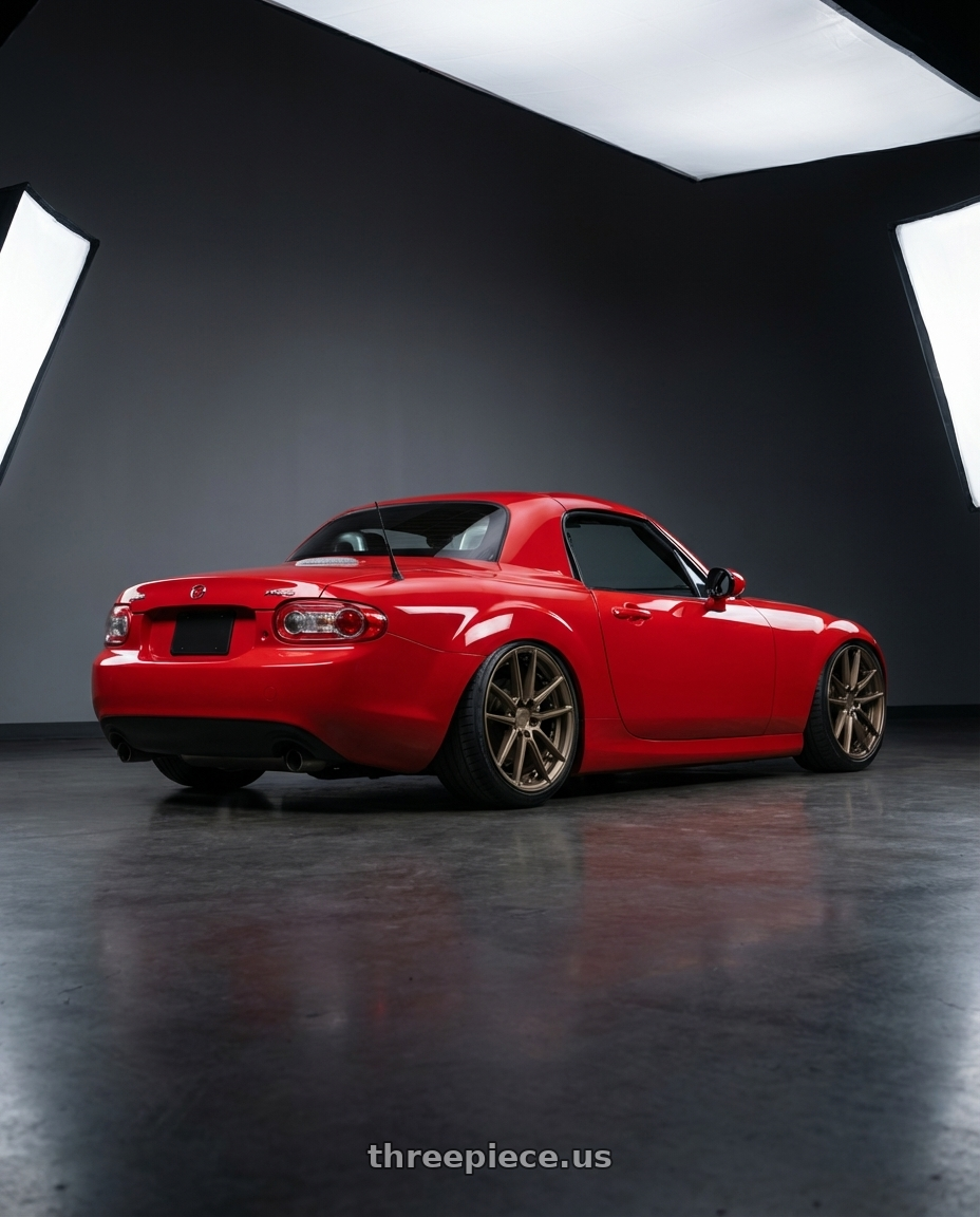 2012 Mazda MX-5 Miata NC with Niche 1PC M222 DFS 5X114.3 17X8 +40 MATTE BRONZE wheels rear three quarter view slight stretch tires