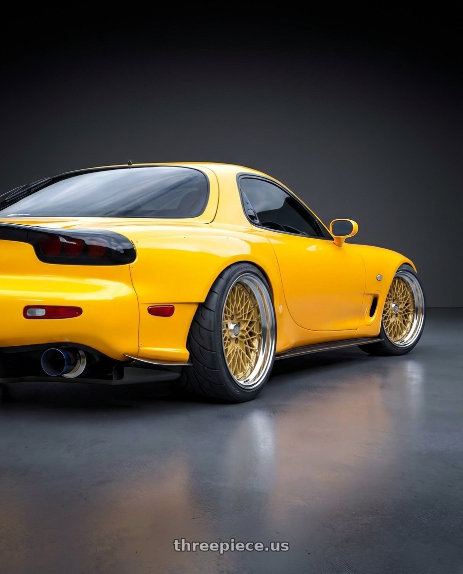 1993 Mazda RX7 with SSR Formula MESH 5X100 18X12+-32 HP Disk Fm Gold wheels rear three quarter view extreme stretch tires