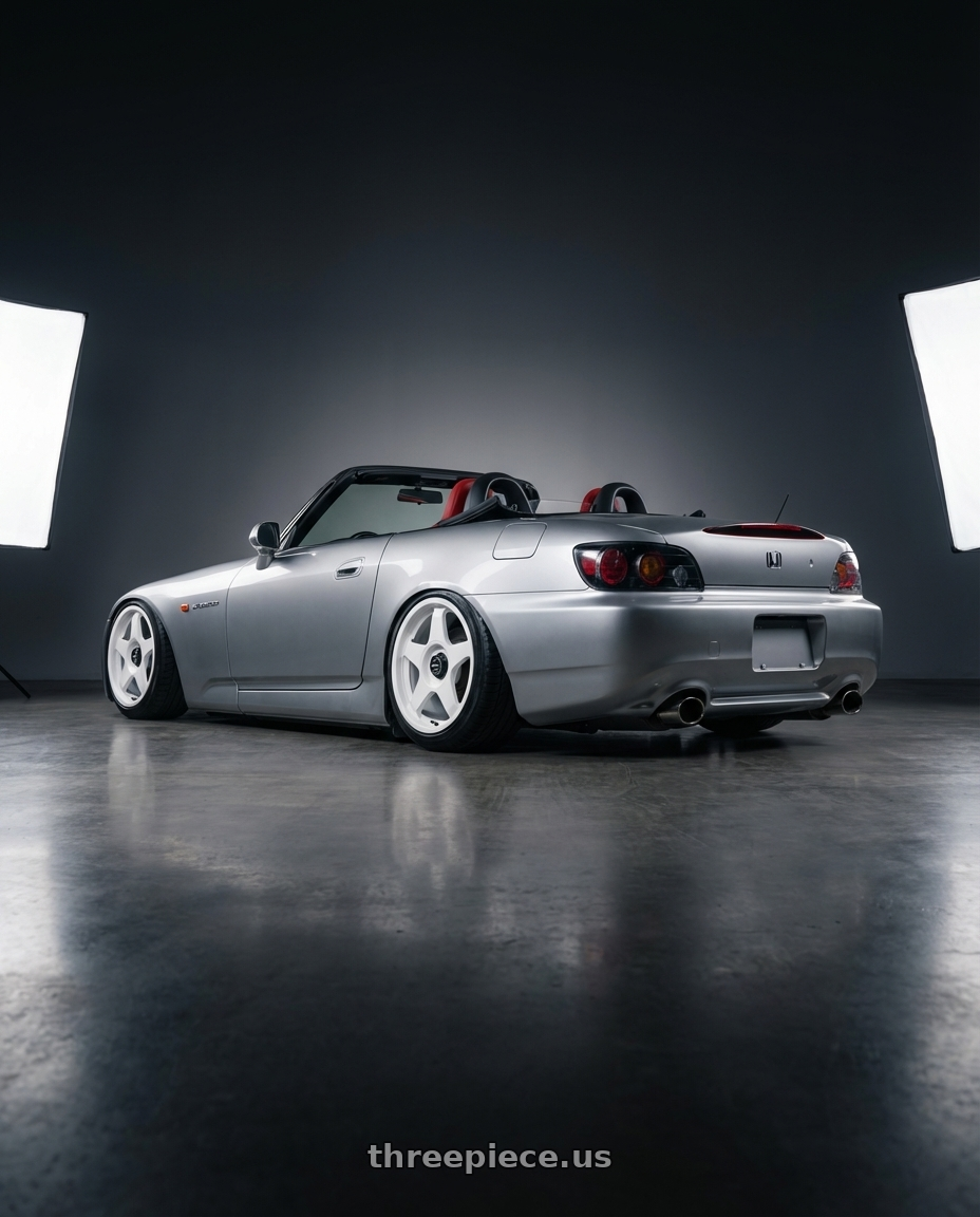 2009 Honda S2000 with fifteen52 CHICANE 5x114.3 / 5x100 18x8.5 +35 RALLY WHITE (GLOSS WHITE) wheels rear three quarter view slight stretch tires