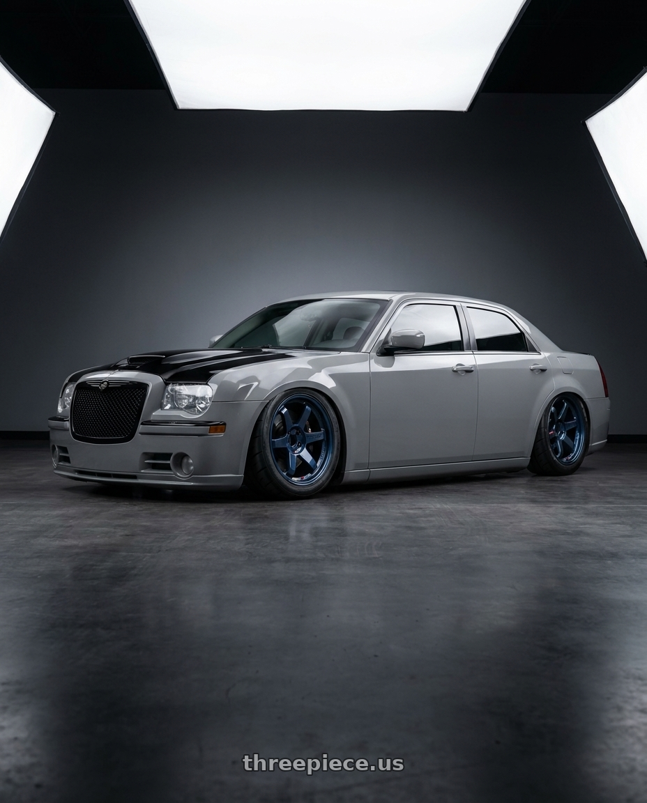 2007 Chrysler 300 srt8 nardo grey black trim black grill hellcat hood with Volk Racing TE37SL 5x114.3 19x9.5 +22 MAG BLUE wheels rear three quarter view meaty tires