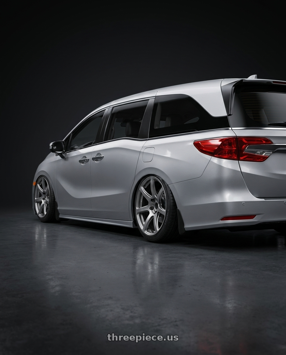 2024 Honda Odyssey with Work Emotion T7r 5x120 18x8.5 +45 Gt Silver wheels rear three quarter view slight stretch tires