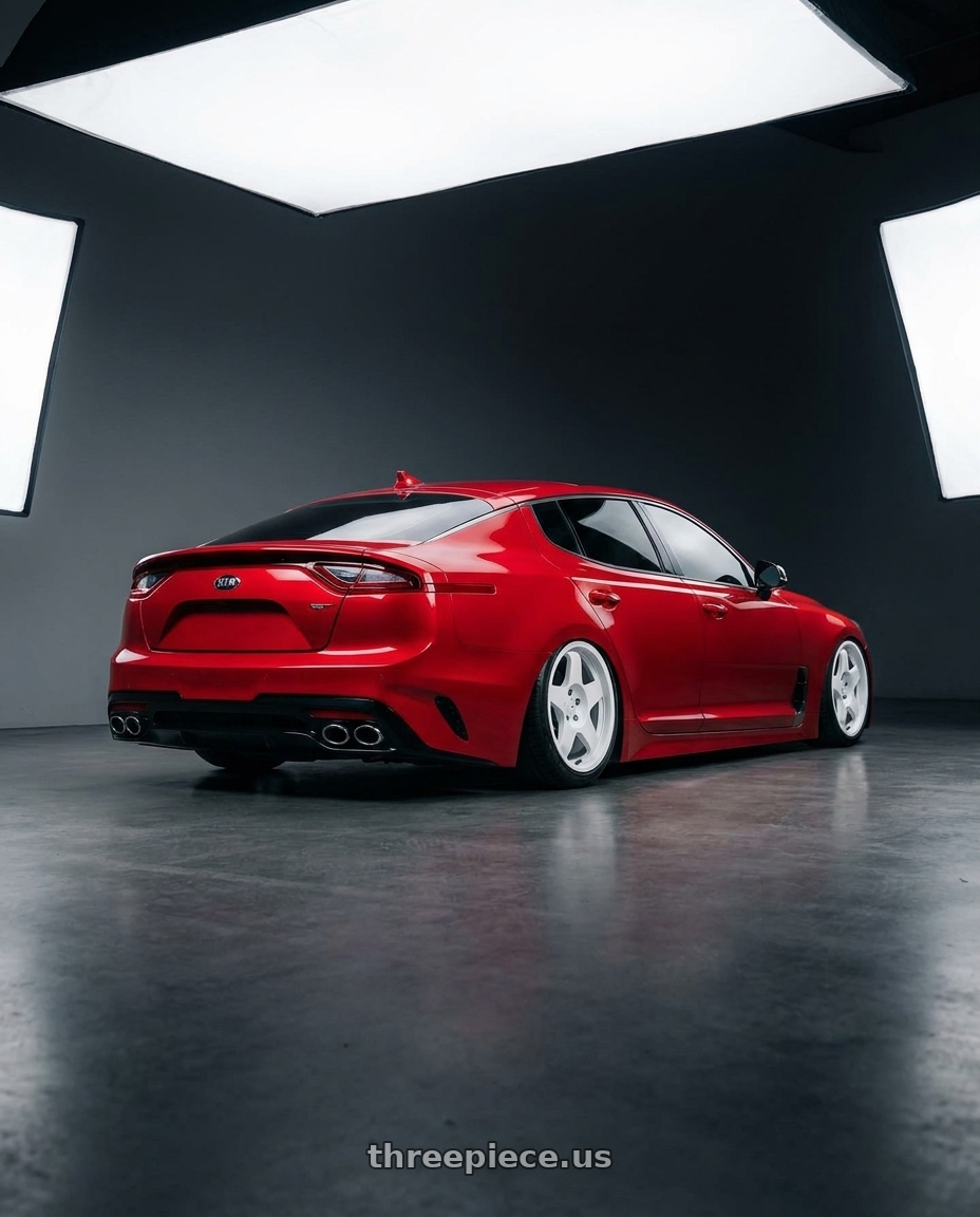 2022 Kia Stinger GT with fifteen52 CHICANE 5x114.3 / 5x120 19x8.5 +35 RALLY WHITE (GLOSS WHITE) wheels rear three quarter view slight stretch tires