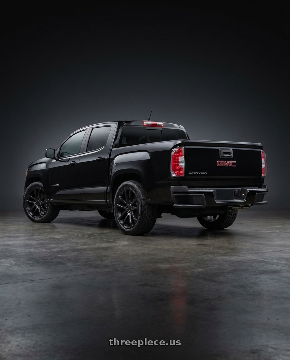 2018 GMC Canyon with OE Wheels CV19 5x120 20x9.5+40 Satin Black wheels rear three quarter view square tires