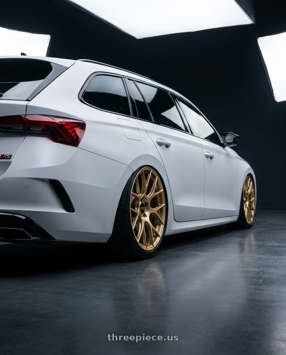 2024 Octavia Combi RS 消光白 with BBS RE-V7 5x112 20x9.5 +15 Gloss Gold wheels rear three quarter view slight stretch tires