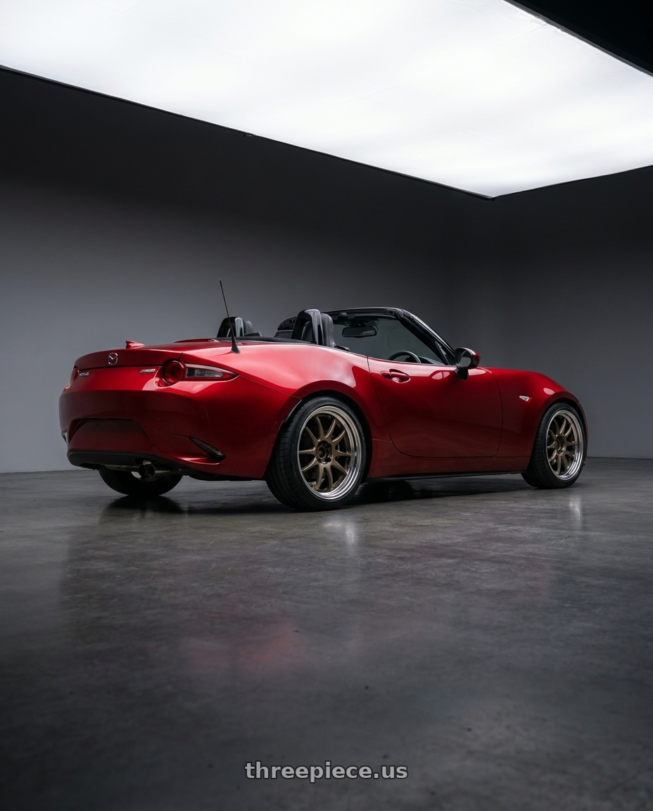 2024 mazda mx5 with Work Cr 2P 4x100 17x8.0 +38 Matte Bronze wheels rear three quarter view square tires
