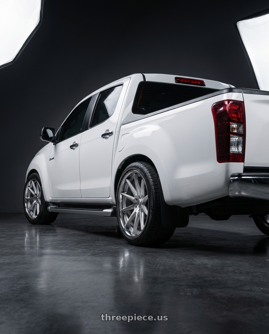 2018 Isuzu dmax with Rohana RFC10 5x112 20x9+42 Machine Silver/Chrome Lip wheels rear three quarter view slight stretch tires