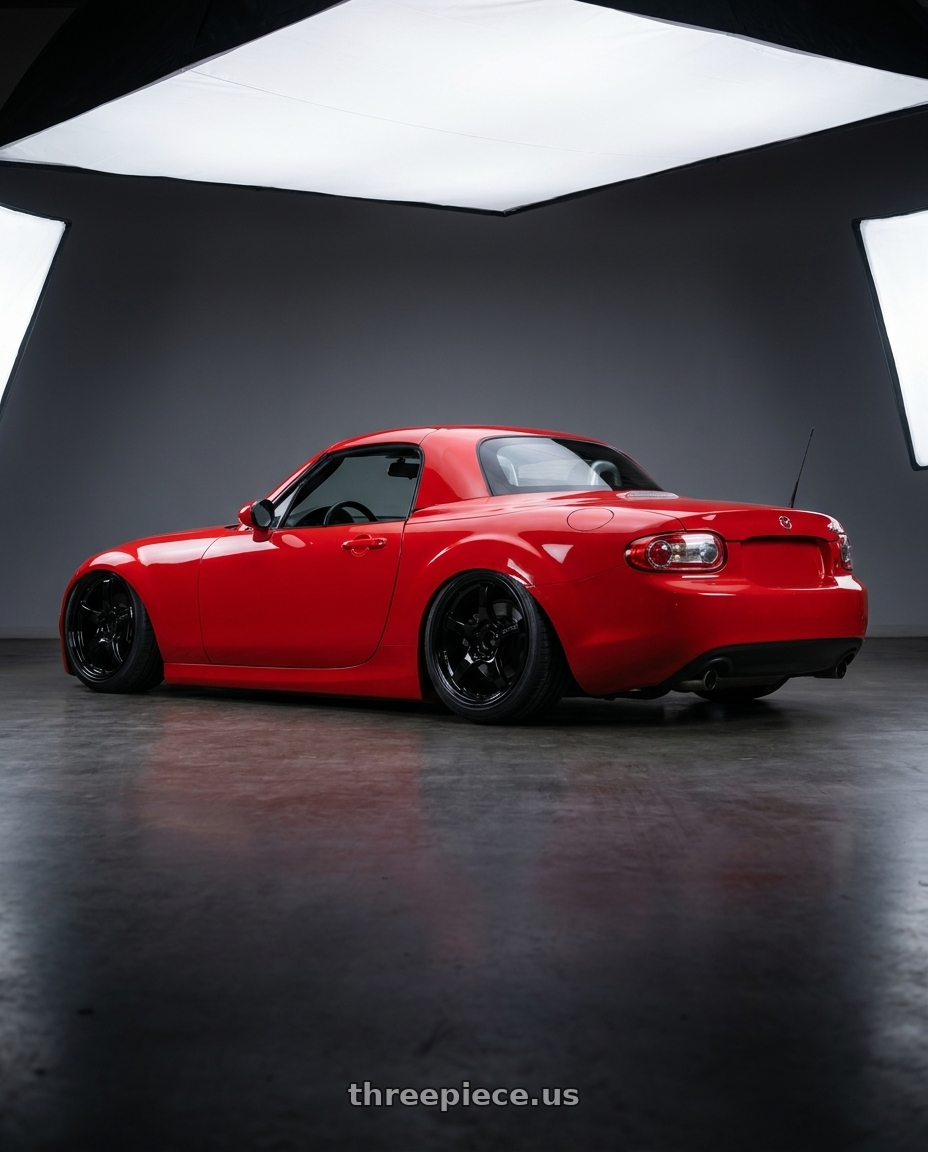 2012 Mazda MX-5 Miata NC with Gram Lights 57CR 5x114.3 17x9+12 Glossy Black wheels rear three quarter view slight stretch tires