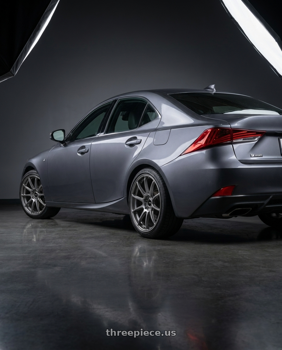 2017 Lexus is 300 f with Enkei Triumph 5x114.3 18x9.5+38 Storm Gray wheels rear three quarter view square tires