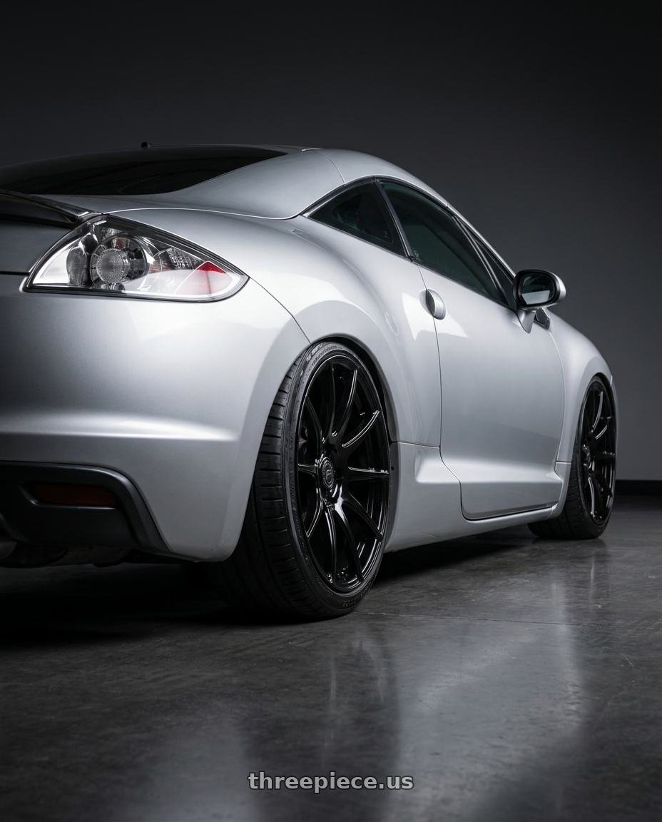 2010 Mitsubishi Eclipse with Forgestar CF10 5x114.3 19x9.5 +29 Gloss Black wheels rear three quarter view slight stretch tires