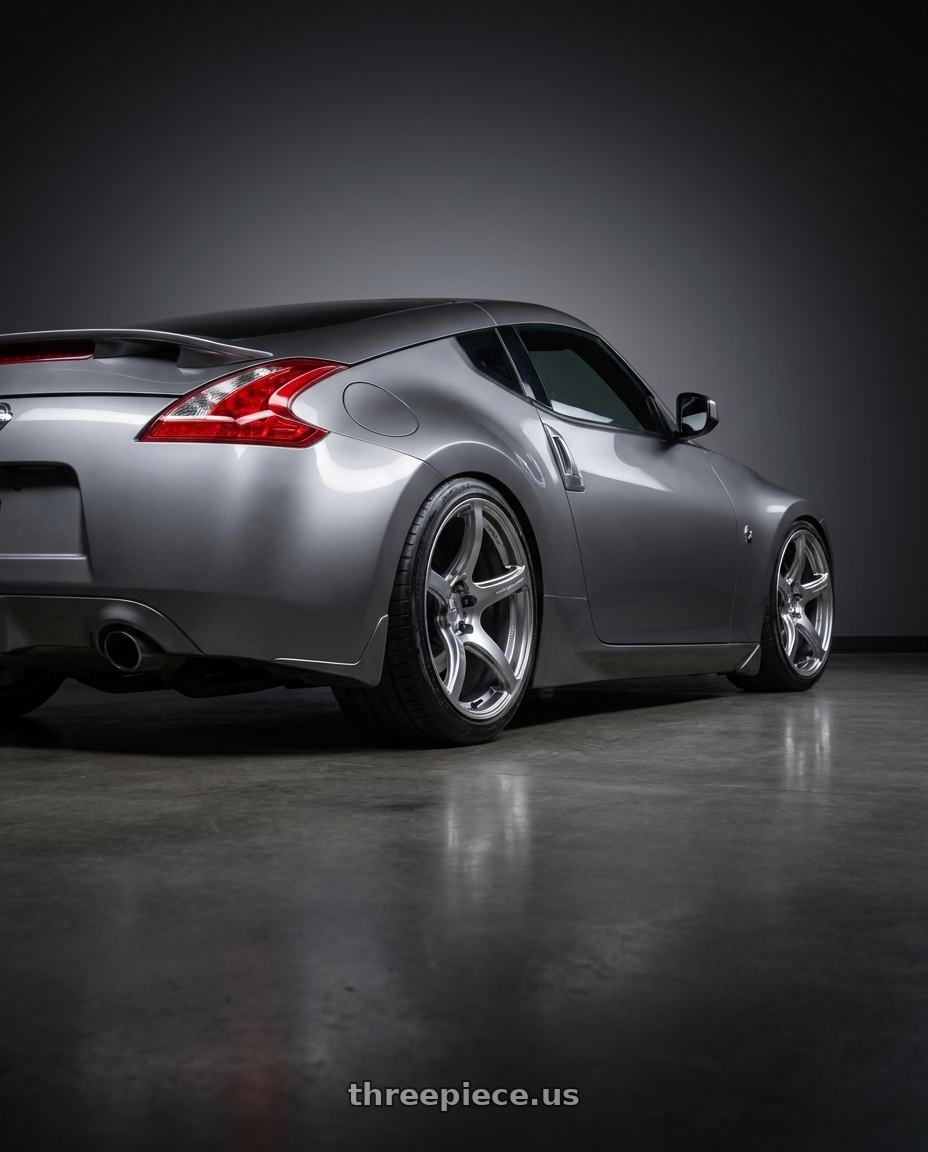 2009 Nissan 370z with Work Emotion T7r 5x100 18x10.5 +12 Gt Silver wheels rear three quarter view square tires