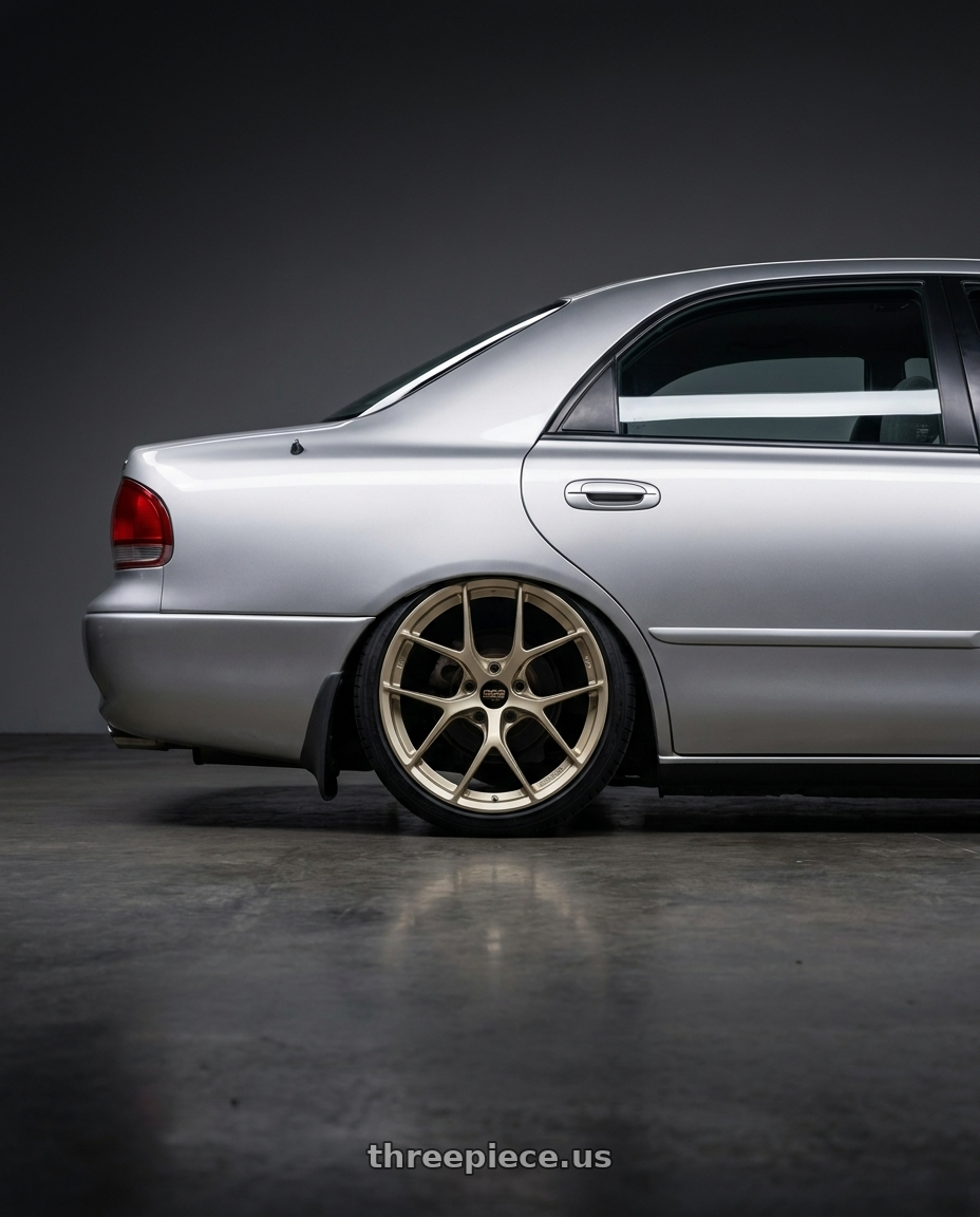1997 Ford telstar with BBS FI-R 5x112 19x9 +35 White Gold wheels rear three quarter view slight stretch tires