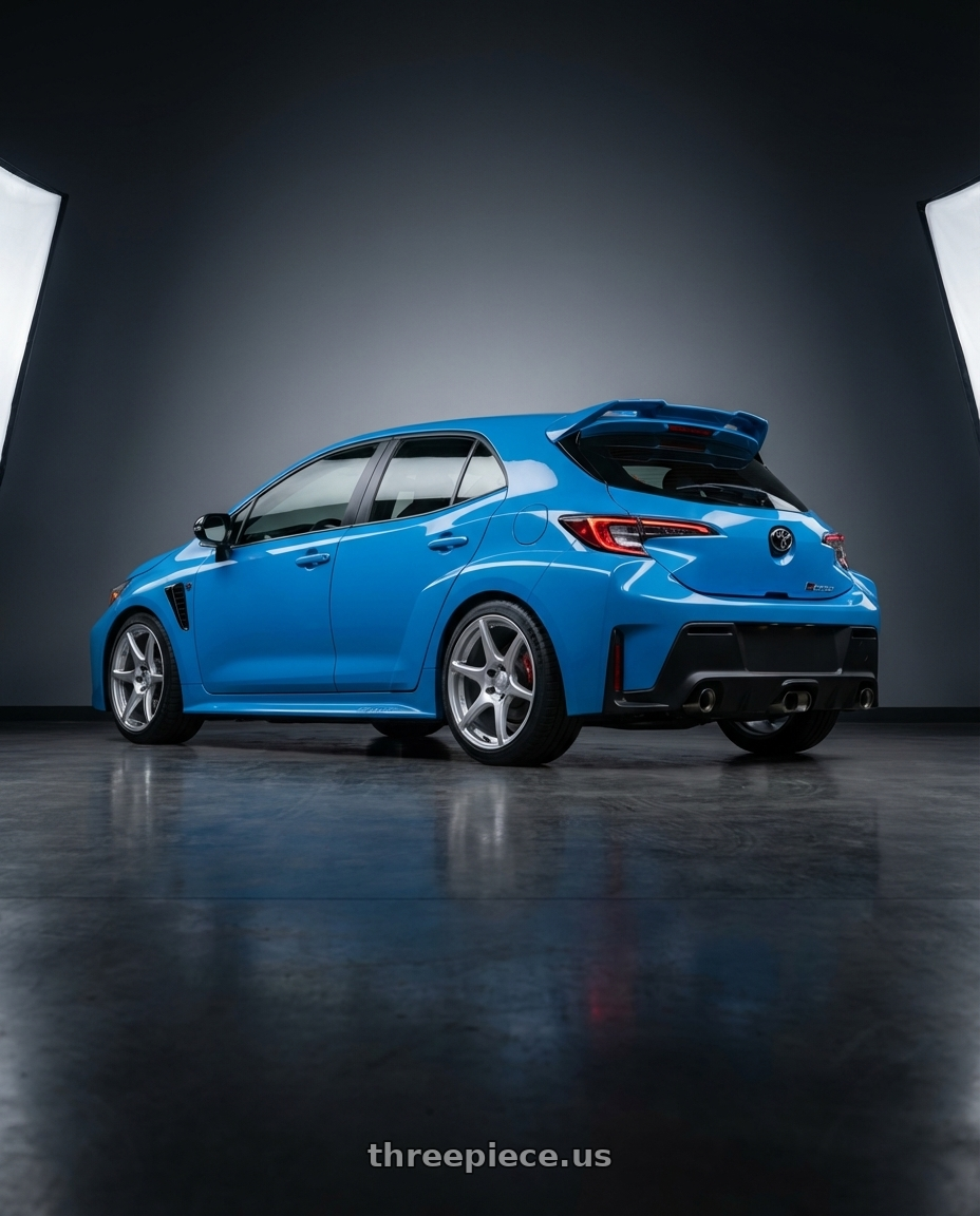 2024 Toyota GR Corolla with Kansei K11S Tandem 5x114.3 18x9 12 Hyper Silver wheels rear three quarter view square tires