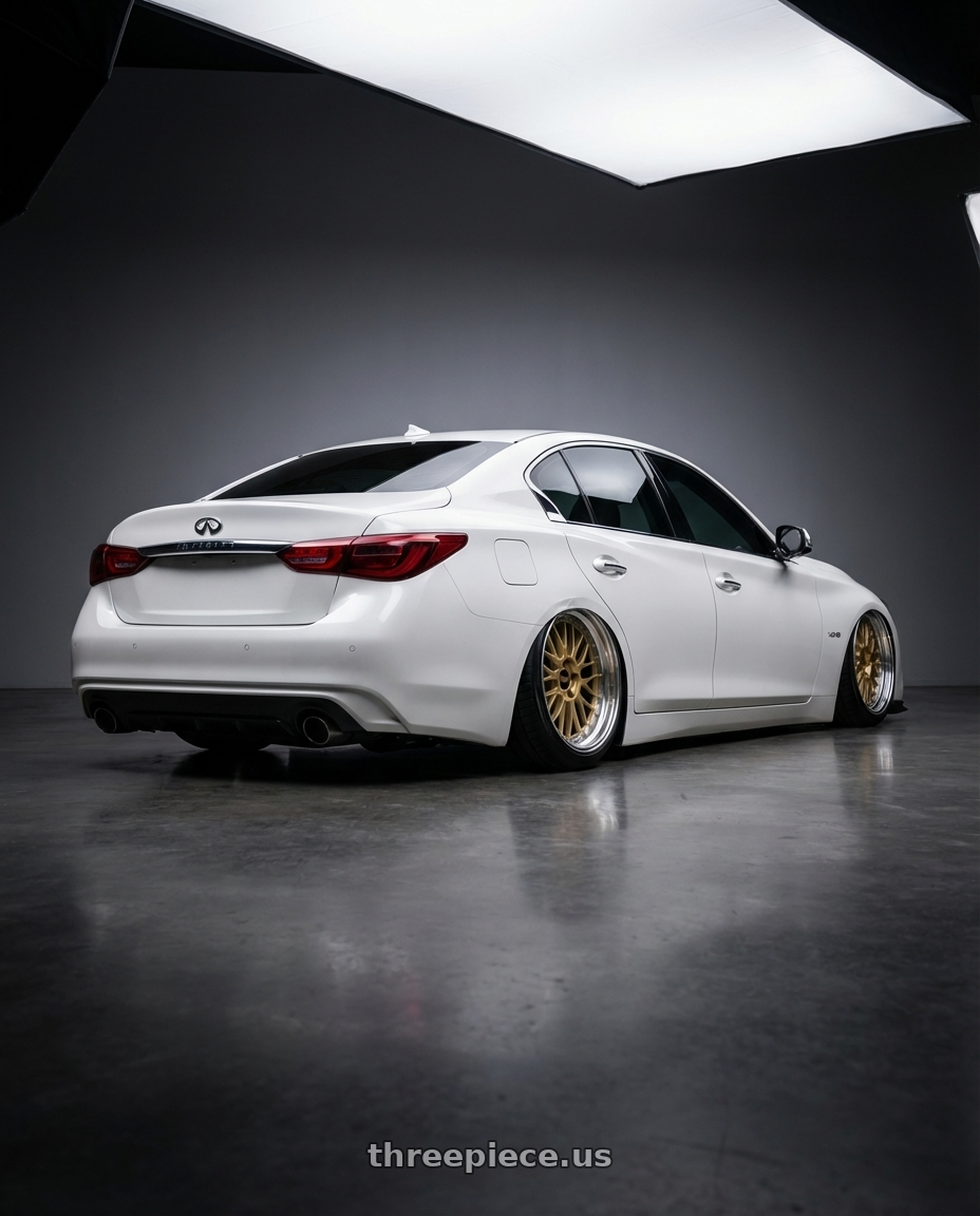 2020 Infiniti Q50 with BBS LM 5x114.3 20x10 +38  Gold Center Diamond Cut Lip wheels rear three quarter view slight stretch tires