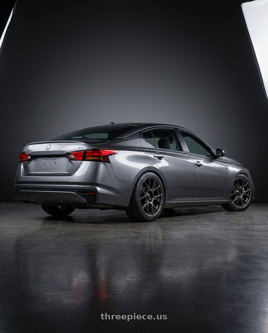 2021 Nissan Altima SV with Konig Ampliform 5x114.3 18x8.5+45 Dark Metallic Graphite wheels rear three quarter view square tires