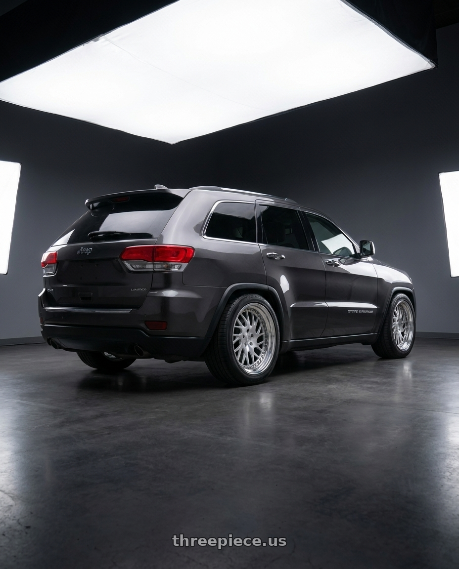 2017 grand jeep Cherokee limited  with Heritage Wheel OKAYAMA-DIR wheels rear three quarter view square tires