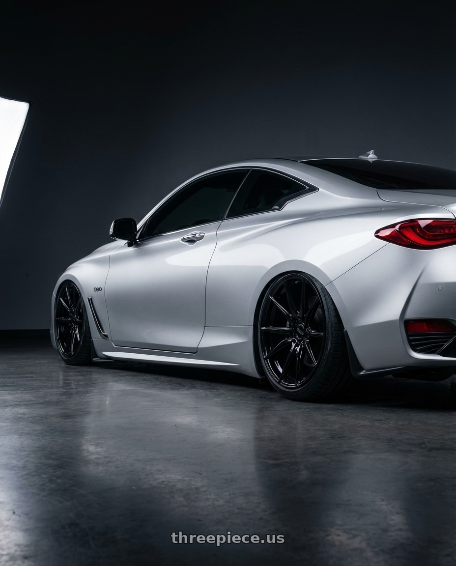 2020 Infiniti Q60 with Avant Garde Wheels M520R 5X114.3 20x9 +32 Gloss Black wheels rear three quarter view slight stretch tires