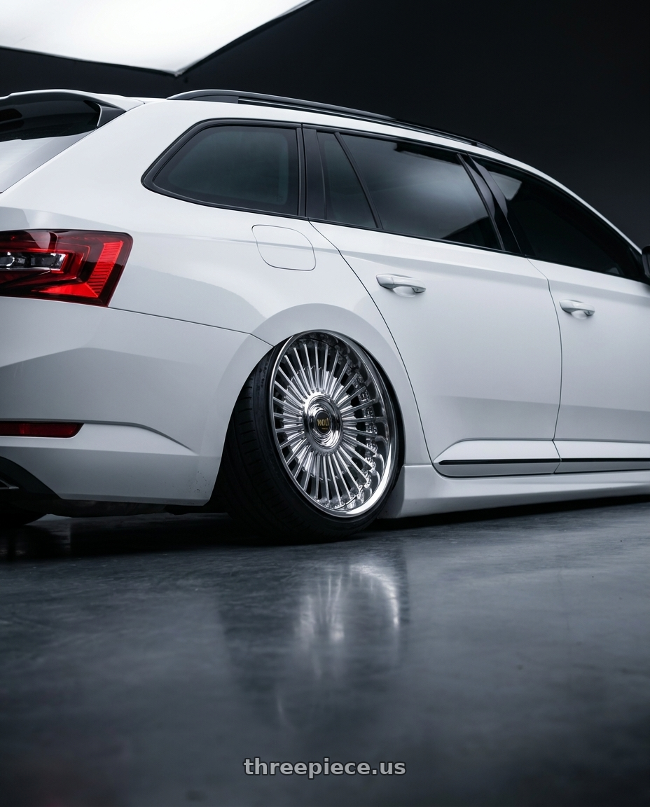 2018 superb combi with Work Emitz Black Polish 5x100 19x7.5 +38 wheels rear three quarter view slight stretch tires