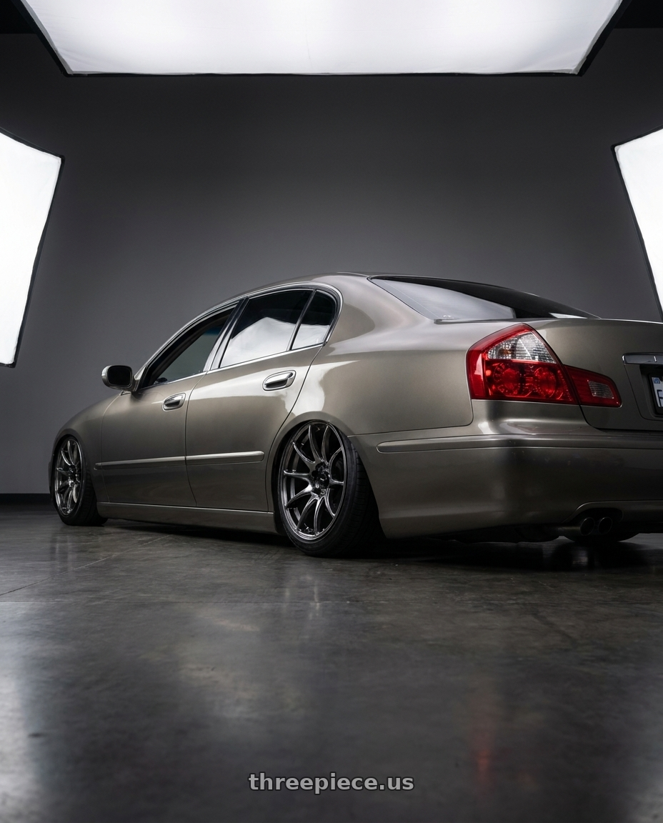 2005 INFINITI Q45 with Vors TR4 5x114.3 19x8.5  +35 Hyper Black wheels rear three quarter view slight stretch tires