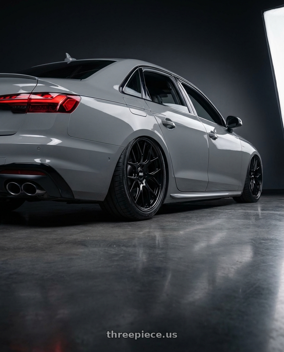 2023 Audi S4 B9 with BBS RE-V7 5x112 20x9.5 +15 Gloss Black wheels rear three quarter view slight stretch tires