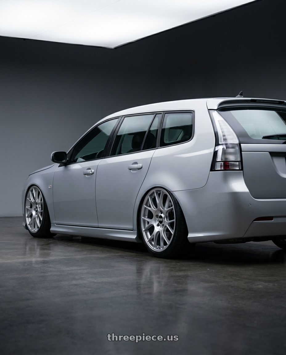 2010 Saab 9 3 sportcombi silver with BBS CH-R 5x112 19x8.5 +40 Brilliant Silver Polished Rim Protector wheels rear three quarter view slight stretch tires