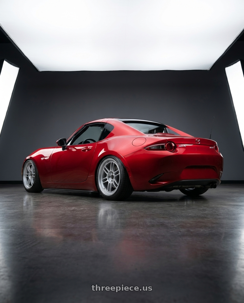 2016 Mazda miata with Enkei RPF1 4x100 17x7+43 Silver wheels rear three quarter view slight stretch tires