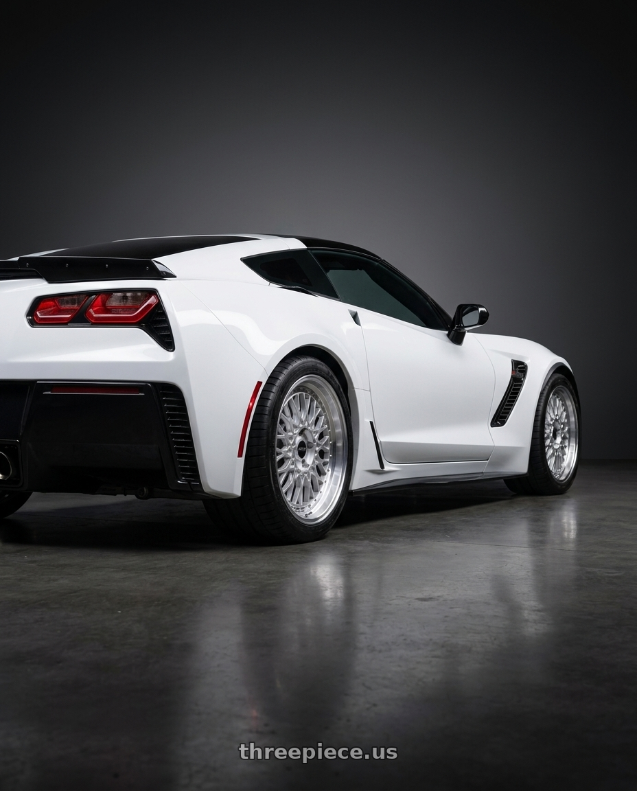 2016 Chevy corvette with ARC AR1 5x108 17x8.5  +35 Silver Machine Face Lip Chrome Rivet wheels rear three quarter view square tires