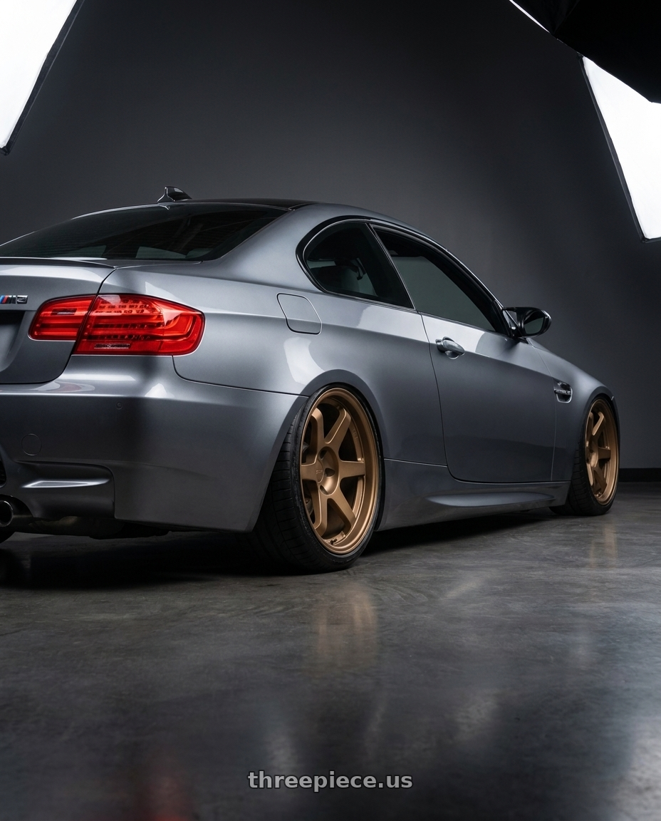 2013 BMW M3 with 9six9 SIX-1 5x120 18X8.5 +35 Matte Bronze wheels rear three quarter view slight stretch tires