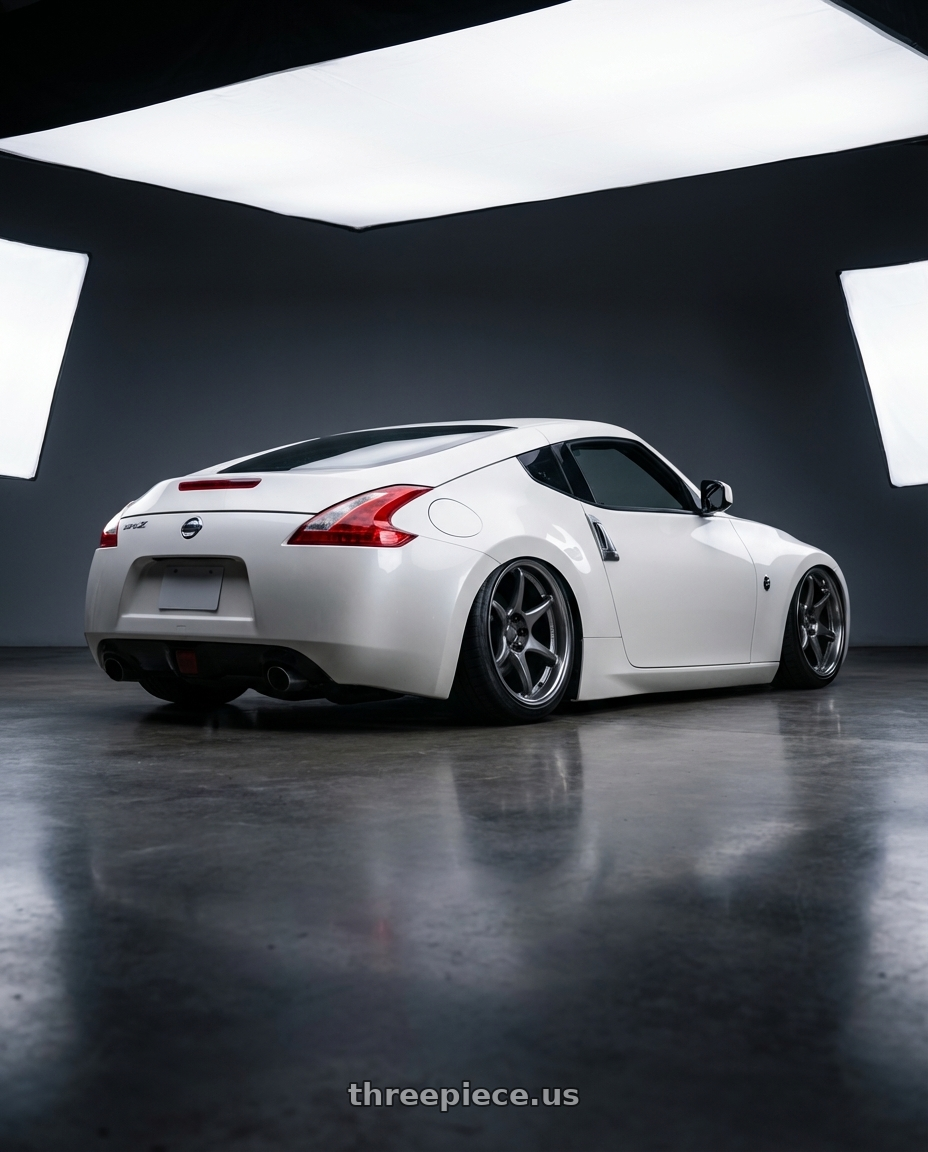 2019 Nissan 370Z with Kansei K11G Tandem 5x114.3 19x10.5 12 Gunmetal wheels rear three quarter view slight stretch tires