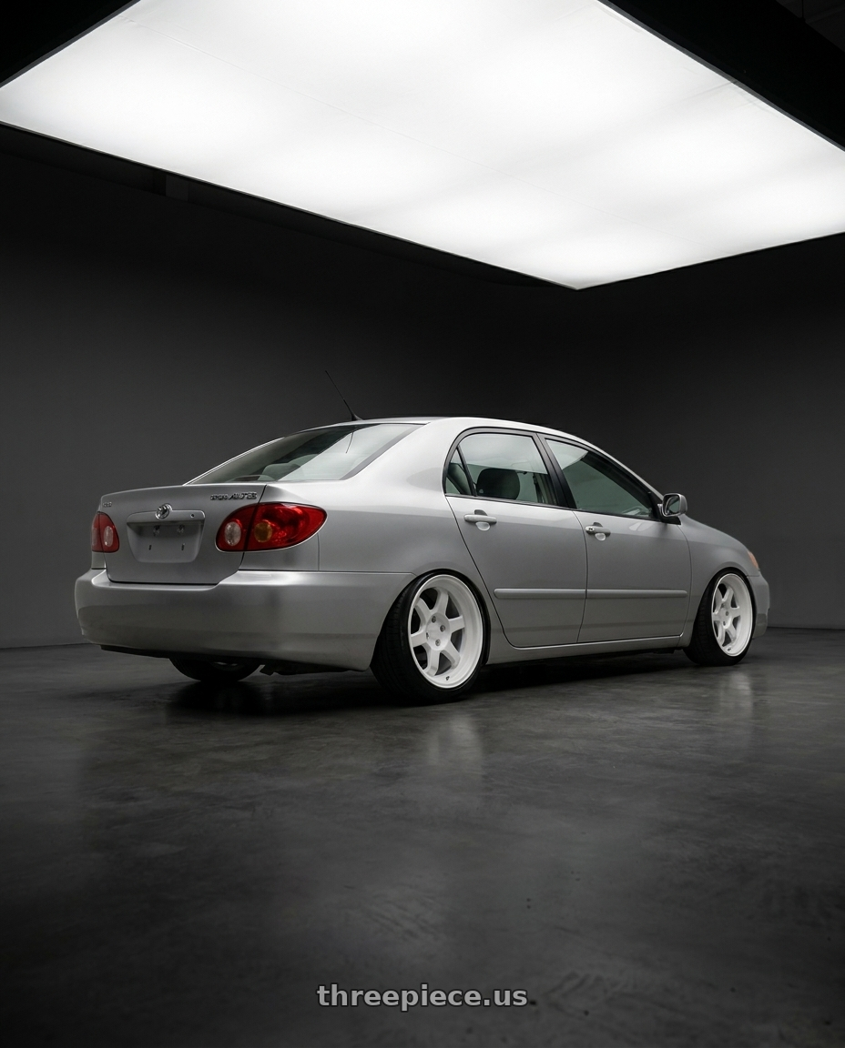 2003 Toyota altis with 9six9 SIX-1 Deep 4x100 15X8 +20 Competition White wheels rear three quarter view slight stretch tires