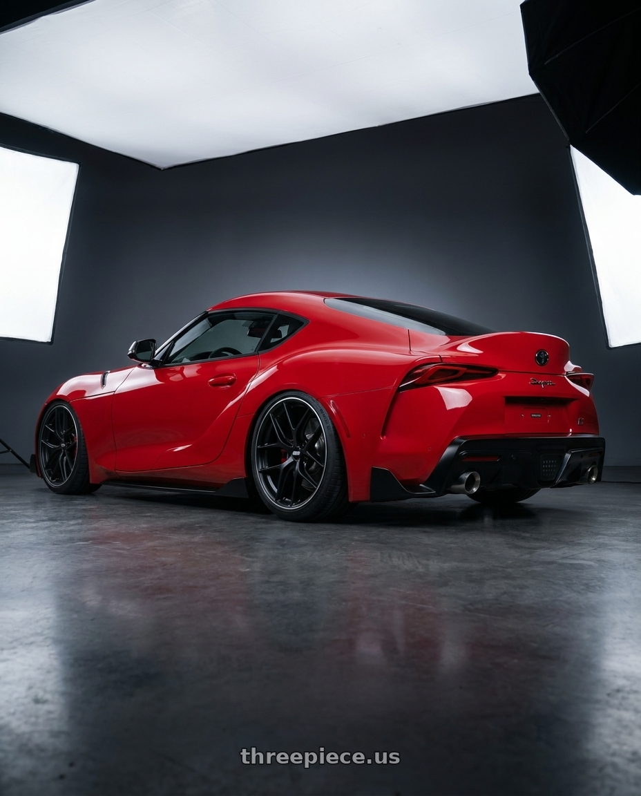 2023 Toyota GR Supra with BBS CC-R 5x112 19x8.5+40 Satin Black wheels rear three quarter view slight stretch tires