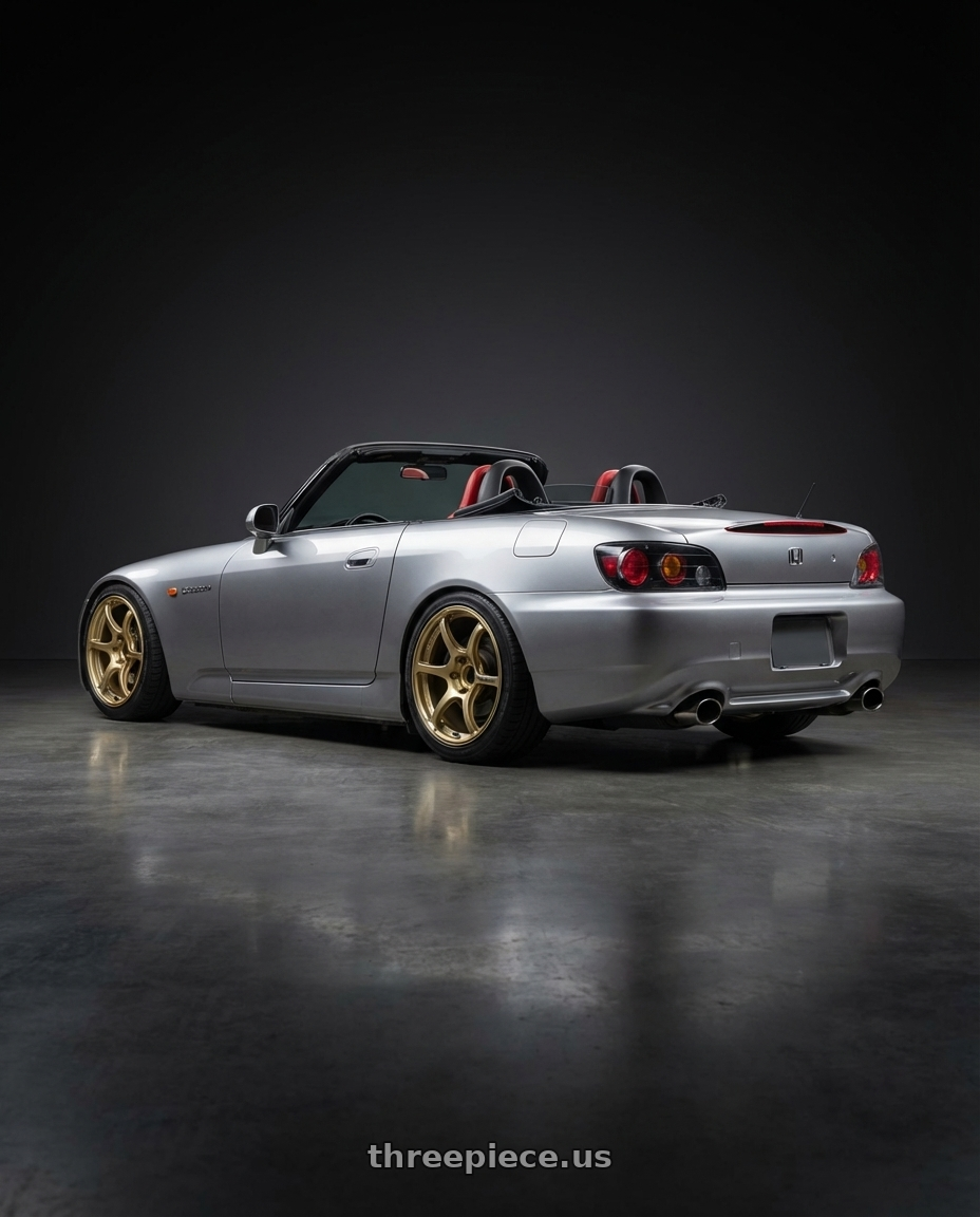 2009 Honda S2000 with Advan RGIII 5x114.3 17x8.0+45 Gold wheels rear three quarter view square tires